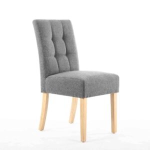 A gray, tufted fabric chair with a cushioned seat, featuring light wooden legs. The design is modern and elegant, conveying a sense of comfort and style.
