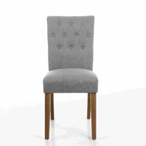 A grey upholstered dining chair with a high, button-tufted backrest and light wooden legs, set against a plain white background. The tone is elegant and simple.